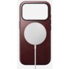 Bordowe etui na telefon z dużym, okrągłym, białym elementem na środku, do którego podłączony jest biały kabel. Etui ma prostokątny otwór na aparat w górnej części.
