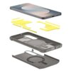 Na zdjęciu widoczny jest rozłożony na części etui do telefonu, składający się z kilku warstw, w tym żółtych elementów i metalicznej obudowy z okrągłym wzorem. Na obudowie znajdują się napisy: "Air Cushion Technology" oraz "Tough Armor".