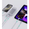 Na zdjęciu znajduje się biały powerbank z logo "AUKEY", do którego podłączone są trzy urządzenia za pomocą kabli. Na ekranach urządzeń widoczne są godziny: 15:30 i 9:41.