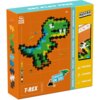 Pomarańczowe opakowanie klocków plastikowych PLUS-PLUS z grafiką przedstawiającą dinozaura T-rex złożonego z kolorowych elementów. Na opakowaniu widnieją napisy: "PLUS PLUS", "T-REX", "CREATE IN 3D", "PUZZLE BY NUMBER", oraz informacje o zawartości: "250 