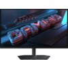 Monitor z wyświetlonym na ekranie trójwymiarowym napisem "GAMING" w stylu neonowym, z widocznym logo "GIGABYTE" na obudowie. Tło jest ciemne, a elementy graficzne mają niebiesko-czerwone podświetlenie.