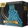 Czarny pudełko z geometrycznym wzorem i niebieskim konturem postaci, z napisami "Pokémon Trading Card Game", "Elite Trainer Box", "Mega Evolution" oraz ostrzeżeniem: "WARNING: CHOKING HAZARD Small parts. Not for children under 3 years."