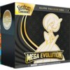 Pudełko z grą karcianą "Pokemon TCG Mega Evolution Elite Trainer Box" z grafiką przedstawiającą postać Gardevoir na tle geometrycznego wzoru. Na opakowaniu widnieją napisy: "Pokémon Trading Card Game", "Elite Trainer Box", "Mega Evolution" oraz ostrzeżeni
