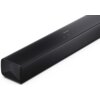 Czarny soundbar z widocznym logo "SHARP" na górnej powierzchni oraz symbolami przycisków dotykowych: włączania, Bluetooth, zmniejszania i zwiększania głośności. Przód urządzenia pokryty jest siatką ochronną.
