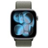 Smartwatch z ciemnozielonym paskiem, wyświetlający abstrakcyjny wzór z niebieskimi i czarnymi elementami na ekranie. Pasek ma teksturę przypominającą tkaninę.
