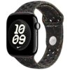 Czarny pasek do zegarka z kolorowymi akcentami i perforacjami, z widocznymi napisami "WATCH" i logo Nike. Na ekranie zegarka wyświetla się godzina 10:09 z geometrycznym wzorem w tle.