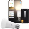 Opakowanie inteligentnej żarówki LED z napisem "PHILIPS hue E27 White 1100" oraz ikonami wskazującymi kompatybilność z "matter", "Alexa", "Apple Home" i "Google Home". Obok opakowania znajduje się żarówka oraz ilustracja aplikacji do sterowania jasnością 