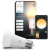 Na zdjęciu znajduje się opakowanie inteligentnej żarówki LED PHILIPS HUE z oznaczeniami: "E27", "White ambiance", "1100", oraz logotypy kompatybilności z "matter", "alexa", "Apple Home" i "Google Home". Obok opakowania widoczna jest żarówka oraz ekran sma