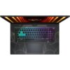 Na zdjęciu widoczny jest otwarty laptop z podświetlaną klawiaturą w różnych kolorach, z wyraźnym wzorem na obudowie wokół klawiatury. Na górnej części ekranu znajduje się logo producenta.