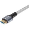 Na zdjęciu widoczny jest kabel HDMI z plecionym oplotem, zakończony metalową wtyczką z napisem "MONTIS". Wtyczka ma złote styki i czarną, gumową osłonę.
