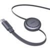 Szary kabel USB-C do USB-C z płaskim przewodem, zakończony z jednej strony wtyczką z napisem "UGREEN", a z drugiej strony okrągłym elementem z napisem "UGREEN 100W".