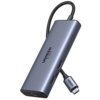Srebrny hub USB typu C z kilkoma portami, w tym HDMI, z widocznym logo "UGREEN 4K 60HZ" na obudowie. Kabel zakończony wtykiem USB typu C z napisem "UGREEN".