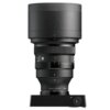 Czarny obiektyw fotograficzny z widocznymi oznaczeniami "135mm 1:1.4 DG" oraz logo "SIGMA". Na obiektywie znajdują się pierścienie z oznaczeniami przysłony od 1.4 do 16.