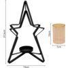 Czarny świecznik w kształcie gwiazdy o wysokości 31,5 cm i szerokości 19 cm, obok znajduje się przezroczysty, bursztynowy cylinder o wysokości 10 cm i średnicy 7 cm.