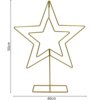 Dekoracyjna gwiazda z metalu w kolorze złotym, o wysokości 50 cm i szerokości 40 cm, zbudowana z dwóch zarysów gwiazd umieszczonych na prostokątnej podstawie.