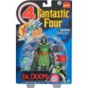 Opakowanie zawiera figurkę postaci w zielonym stroju z metalicznymi elementami, dodatkowe akcesoria oraz książki. Na górze widnieje napis "Fantastic Four" oraz ostrzeżenie: "WARNING: CHOKING HAZARD - Small parts. Not for children under 3 years."
