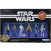 Na zdjęciu znajduje się opakowanie zestawu figurek "Star Wars Retro Collection" z sześcioma postaciami: Dr. Evazan, Walrus Man, Han Solo, Luke Skywalker, Rebel Fleet Trooper i Sandtrooper. Widoczne są również napisy: "ATTENTION: DANGER D'ÉTOUFFEMENT - Pet