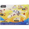 Na zdjęciu znajduje się opakowanie zabawki "Luke Skywalker's Force Strike X-Wing" z serii Star Wars, przedstawiające model statku kosmicznego z efektami świetlnymi i figurką pilota. Widoczne są napisy: "ATTENTION: DANGER D'ÉTOUFFEMENT - Petites pièces. Ne