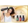 Na zdjęciu widoczna jest suszarka do włosów oraz trzy buteleczki z serum do włosów, oznaczone jako "SILK HAIR + VITAMIN A", "ARGAN OIL" i "BLACK SEED OIL", na tle złotych okręgów. Obok znajduje się logo "LUMINEO".