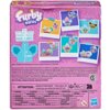 Opakowanie zestawu figurek "Furby Minis" marki Hasbro przedstawia kolorowe ilustracje figurek na tle fioletowego wzoru, z napisem "Furby minis" oraz informacją o wysokości figurek "1'' 2.5cm". Na dole znajdują się ostrzeżenia w różnych językach dotyczące 