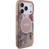 Przezroczyste etui na telefon z różowym akcentem, ozdobione motywem kwiatowym, posiada okrągły element z napisem "GUESS EST. 1981". W tle widoczne są trzy obiektywy aparatu telefonu.