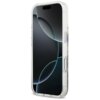Przezroczysto-fioletowe etui na telefon z widocznymi elementami ozdobnymi, przeznaczone do modelu Apple iPhone 17 Pro. Na ekranie telefonu widoczny jest abstrakcyjny wzór z ciemnymi i jasnymi okręgami.