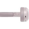 Różowe słuchawki nauszne z widocznym pałąkiem i nausznikiem, na którym znajdują się przyciski sterujące, port USB-C oraz symbol Bluetooth. Na pałąku widoczna jest ikona wskazująca stronę "R".