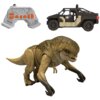 Na zdjęciu znajduje się zestaw zdalnie sterowany, składający się z figurki dinozaura, pojazdu terenowego z figurką kierowcy oraz pilota do sterowania. Dinozaur ma brązową skórę i ostre zęby, pojazd jest w kolorach czarnym i beżowym, a pilot ma szary kolor