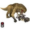 Na zdjęciu znajduje się duża figurka dinozaura z czerwonymi oczami, obok której stoi zdalnie sterowany pojazd terenowy z figurką w środku. W lewym dolnym rogu widoczne są ikony przedstawiające żarówkę i głośnik.