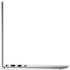 Na zdjęciu widoczny jest srebrny laptop w profilu, z otwartą pokrywą, ukazujący porty na boku obudowy, w tym gniazdo zasilania, HDMI, USB i USB-C. Tło jest białe, a laptop ma smukły design.