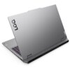 Srebrny laptop z widocznym logo "LOQ" na pokrywie, z otwartą klawiaturą i widocznymi portami wentylacyjnymi z tyłu. Na obudowie znajduje się również logo "Lenovo".