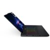 Na zdjęciu widoczny jest otwarty laptop z kolorowo podświetlaną klawiaturą i ekranem wyświetlającym abstrakcyjną grafikę w odcieniach niebieskiego i czerwonego. Obudowa laptopa jest ciemna, a na ekranie znajduje się logo producenta.