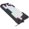 Na zdjęciu znajduje się klawiatura mechaniczna z podświetleniem RGB, z białymi i czarnymi klawiszami oraz pokrętłem w lewym górnym rogu. Na obudowie widoczne jest logo "REDRAGON".