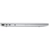 Srebrny laptop widoczny z boku z kilkoma portami, w tym HDMI, USB-C i gniazdem audio. Na obudowie znajduje się napis "poly studio".