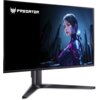 Monitor z logo "Predator" w lewym górnym rogu ekranu, wyświetlający grafikę przedstawiającą postać w futurystycznym stroju na tle miejskiego krajobrazu. Monitor ma nowoczesną podstawę i cienkie ramki.