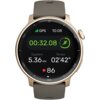 Złoty smartwatch z ciemnym ekranem wyświetla informacje: "GPS", "10:08", "00:32.08", "Dystans 5.36 KM", "Tempo 02'42"", oraz ikonę biegnącej postaci. Na dole ekranu widoczna jest ikona serca z liczbą "86".