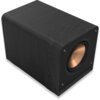 Czarny subwoofer o prostokątnym kształcie z widocznym miedzianym głośnikiem na przednim panelu. Obudowa ma delikatną teksturę przypominającą drewno.