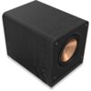 Czarny subwoofer o drewnianej fakturze z widocznym miedzianym głośnikiem na przednim panelu. Produkt ma zaokrąglone krawędzie i cztery widoczne śruby mocujące.