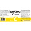 Etykieta produktu "Witamina C 1000 mg" marki Domowa Apteczka zawiera informacje o składzie, zalecanej dziennej porcji oraz ostrzeżenia dotyczące spożycia. Widoczne są także dane producenta, kod kreskowy oraz oznaczenie "90 kapsułek".