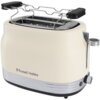 Jasny toster z metalicznymi elementami i uchwytem, z widocznym logo "Russell Hobbs" na obudowie. Na górze znajduje się ruszt do podgrzewania pieczywa.