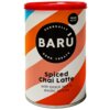 Puszka z napisem "BARÚ Surreally Good Treats" oraz "Spiced Chai Latte with black tea & exotic spices" na tle w pomarańczowo-białe pasy, z czarnym okrągłym logo i oznaczeniem "Vegan Recipe".