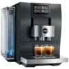 Czarny ekspres do kawy z wyświetlaczem dotykowym pokazującym opcje: Espresso, Coffee, Lungo, Cappuccino. Na ekspresie widoczne jest logo "jura" oraz oznaczenie modelu "Z10", a na tacy znajdują się dwie szklanki z kawą.