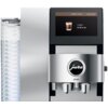Srebrny ekspres do kawy z wyświetlaczem pokazującym ustawienie "Coffee Timer" z napisem "Coffee 6:30 a.m." oraz logo "jura" na przednim panelu. Na ekspresie widoczny jest model "Z10".