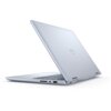 Na zdjęciu widoczny jest srebrny laptop w pozycji półotwartej, z logo "Dell" na pokrywie. Laptop ma smukłą konstrukcję i widoczne są porty na bocznej krawędzi.