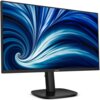 Na zdjęciu widoczny jest monitor z cienkimi ramkami, wyświetlający dynamiczny, niebiesko-biały wzór przypominający wir. Na dolnej ramce monitora znajduje się logo "PHILIPS".