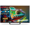 Telewizor wyświetla kolorowy obraz kameleona z widocznymi napisami: "QLED", "Google TV", "HDR" oraz logo "SHARP". Obraz jest wyraźny, z intensywnymi barwami i szczegółami.