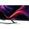Telewizor SHARP 50HR8765E 50" QLED 4K z cienką ramką, wyświetlający dynamiczne, kolorowe fale na ekranie. Na dolnej ramce widoczne są napisy "SHARP" oraz "harman/kardon".