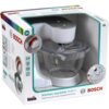 Pudełko zawiera zabawkowy robot kuchenny marki Bosch z przezroczystą misą i białą obudową, oznaczony jako "Kitchen machine MUM 5". Na opakowaniu widnieją napisy: "2-speed", "Replica toy with child-compatible functions", oraz logo "klein".
