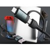Na zdjęciu widoczny jest czarny kabel USB/USB-C - USB-C/Lightning 3MK Hyper N-Series 1.2 m 60W, z logo "3mk" na jednym z końców, otoczony różnymi urządzeniami elektronicznymi. Kabel ma plecioną osłonę i metalowe końcówki, a w tle znajdują się urządzenia takie jak tablet, smartfon i konsola do gier.