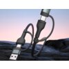 Czarny kabel USB/USB-C - USB-C/Lightning 3MK Hyper N-Series o długości 1.2 m, z plecioną osłoną, jest przedstawiony na tle krajobrazu z kamienistym podłożem i niebem w odcieniach różu i błękitu. Kabel posiada dwa różne złącza na końcach, jedno USB i drugie USB-C/Lightning.